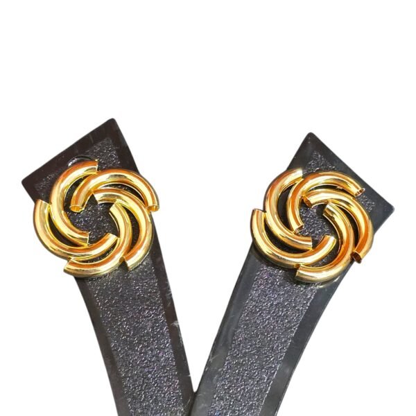 Gold-colored swirl earrings